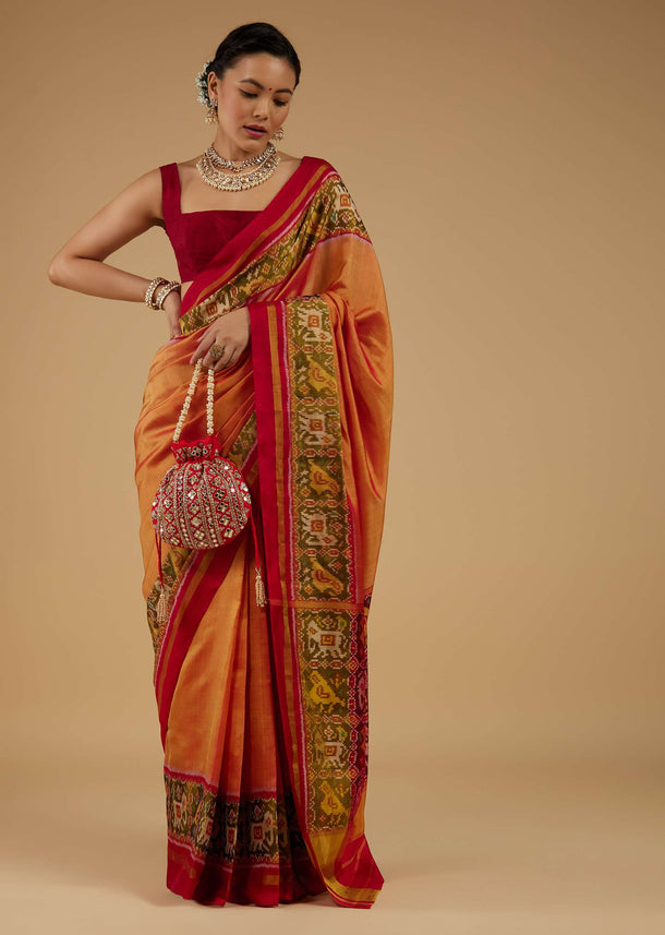 Carrot Orange Saree In Silk With Ikat Weave Patola Work