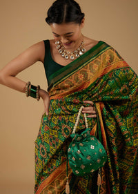 Forest Green Saree In Silk With Ikat Weave Patola Work