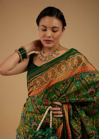 Forest Green Saree In Silk With Ikat Weave Patola Work