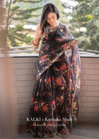 Black Saree In Organza With Floral Print All Over And Moti Embroidered Border Along With Unstitched Blouse