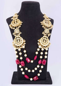 Kundan and moti studded long necklace with multi layer chain in cream pearls and pink marble bead only on kalki