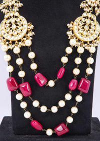 Kundan and moti studded long necklace with multi layer chain in cream pearls and pink marble bead only on kalki