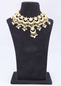 Kundan and pearl studded collar necklace in moon and star motifs only on kalki