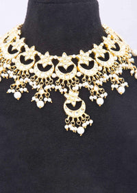 Kundan and pearl studded collar necklace in moon and star motifs only on kalki