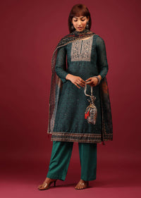Deep Green Palazzo Suit In Tussar Silk With A Stunning Potli Bag