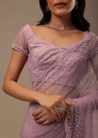 Lavender Pink Stone And Beads Embellished Net Saree