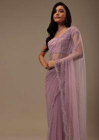 Lavender Pink Stone And Beads Embellished Net Saree