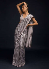 Lavender Ready Pleated Saree In Net With Sequin Embellished Stripes And Velvet Crop Top With Sequins On The Shoulders