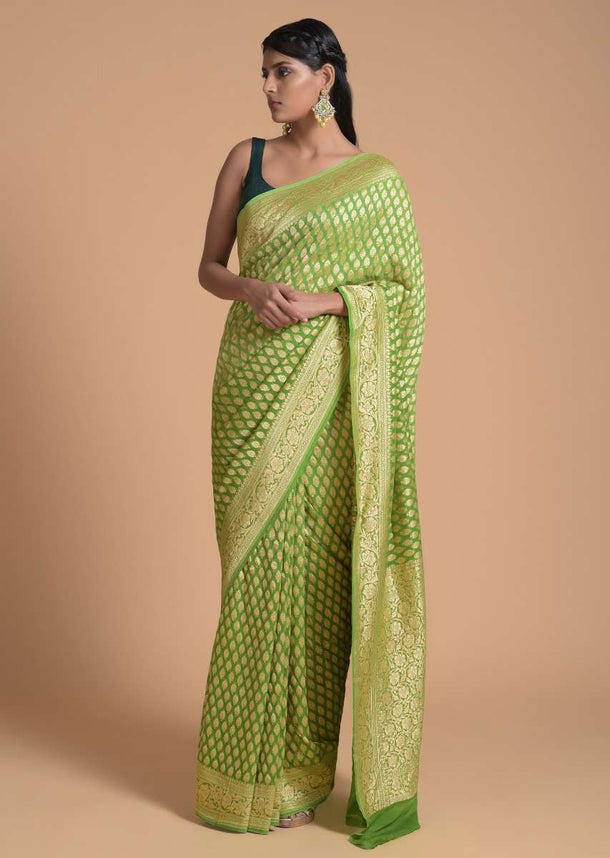 Leaf Green Saree In Georgette With Brocade Weaved Leaf Shaped Buttis Online - Kalki Fashion