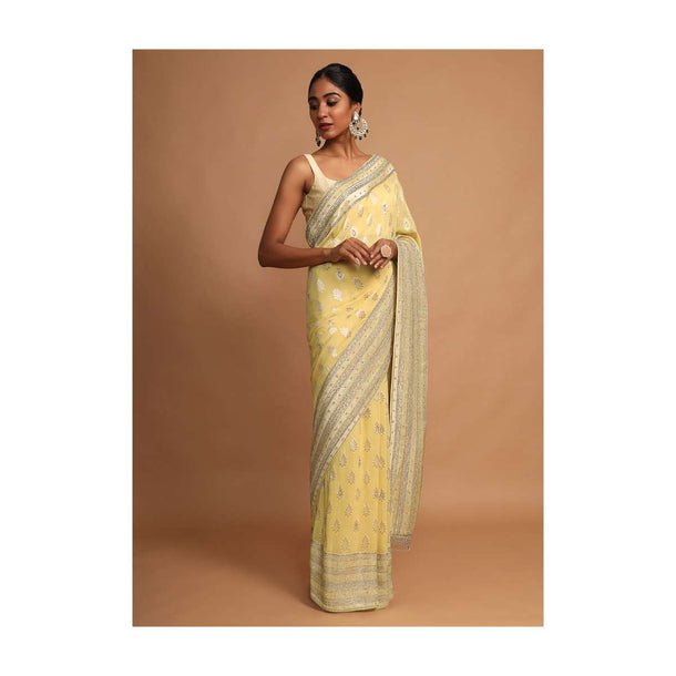 Lemon Yellow Saree In Georgette With Weaved Floral Buttis Online - Kalki Fashion