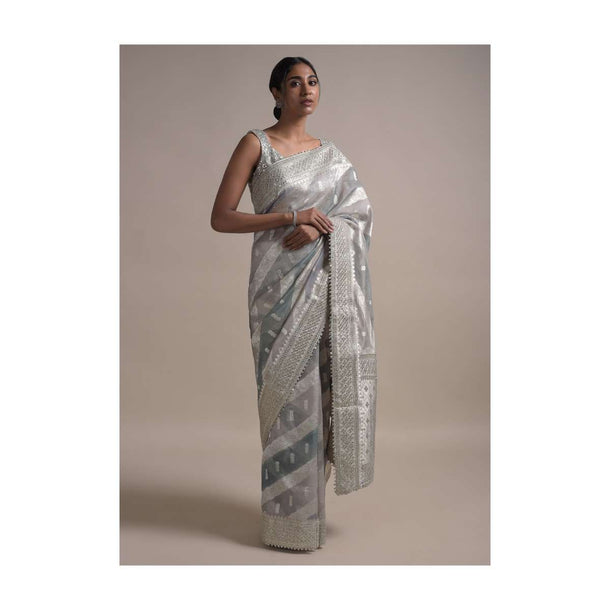 Light And Dark Grey Shaded Saree In Organza With Weaved Floral Pattern In Diagonal Stripes Online - Kalki Fashion