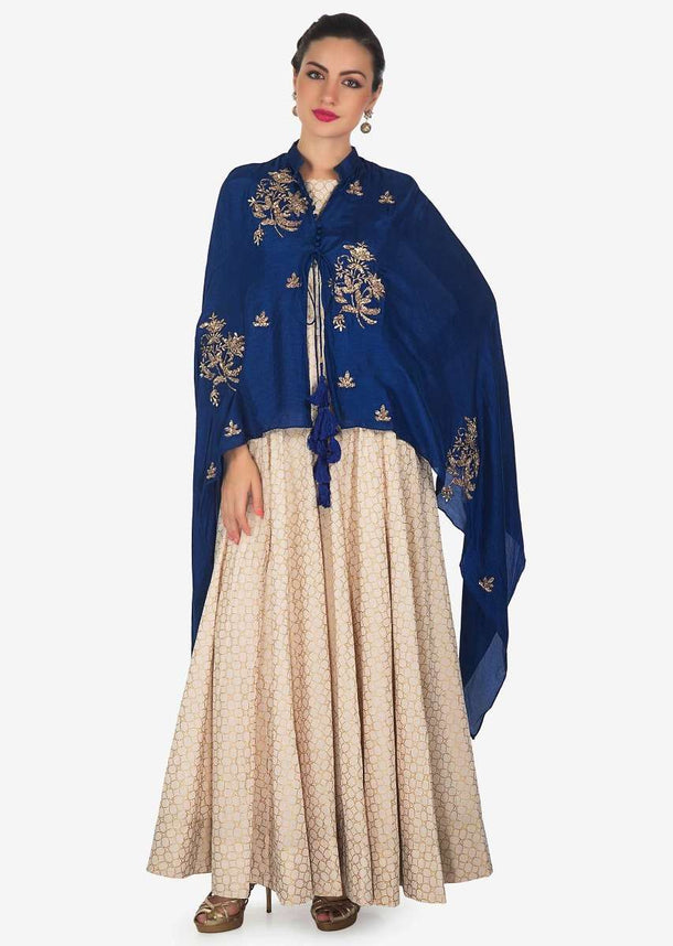 Cream Anarkali Suit Matched With Royal Blue Embroidered Fancy Cape Online - Kalki Fashion