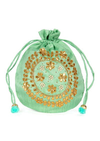 Light green velvet potli bag embellished in gotta patch and moti kalki