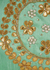 Light green velvet potli bag embellished in gotta patch and moti kalki