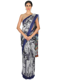 Light grey saree in abstract human face print all over only on Kalki