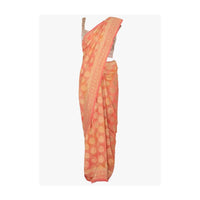 Light peach georgette saree in stripes and weaved butti only on Kalki