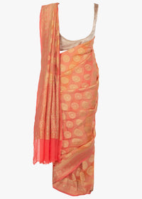 Light peach georgette saree in stripes and weaved butti