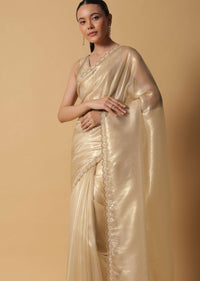 Light Gold Toned Foil Saree In Tissue With Cut Dana Embroidered Borders