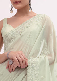 Light Green Organza Saree With Unstitched Blouse