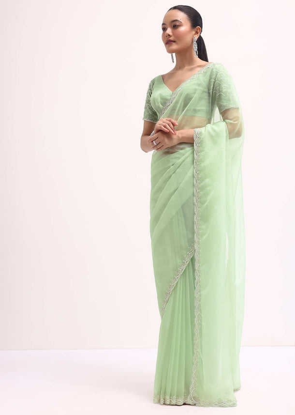 Light Green Scallop Border Saree With Unstitched Blouse