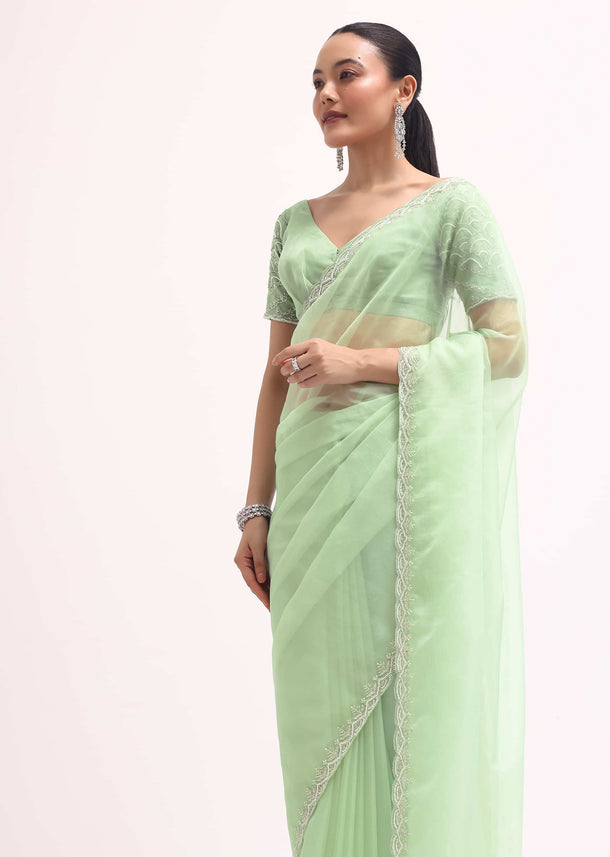 Light Green Scallop Border Saree With Unstitched Blouse