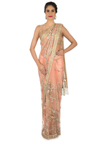 Light peach saree in net with resham and velvet floral embroidery