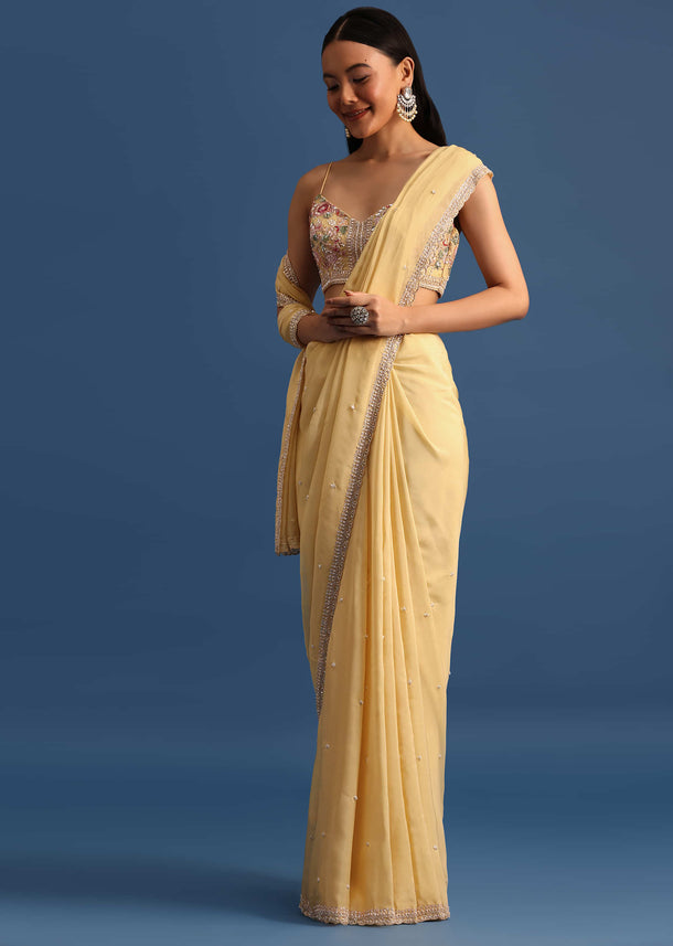 Light Yellow Stone Embroidered Crepe Saree With Unstitched Blouse