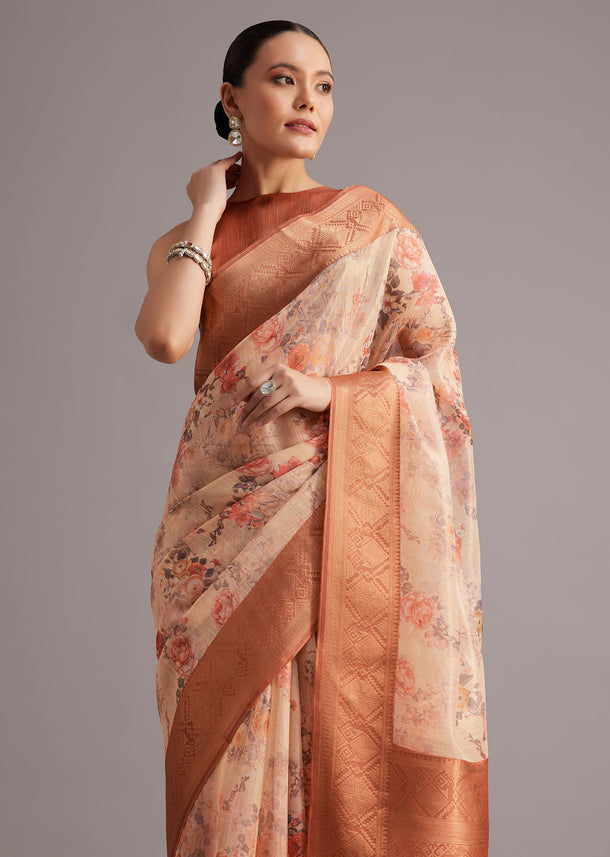 Light Yellow Tissue Silk Floral Printed Saree With Zari Woven Border