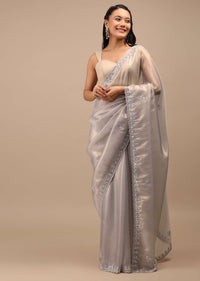 Lilac Grey Glass Tissue Saree In Mirror Abla Embroidery Buttis, Border Has Zari Embroidery Detailing