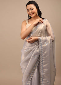 Lilac Grey Glass Tissue Saree In Mirror Abla Embroidery Buttis, Border Has Zari Embroidery Detailing