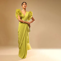 Lime Green Saree In Crepe With Elaborate Ruffle Sleeved Crop Top And Heavy Stone Embroidered Belt