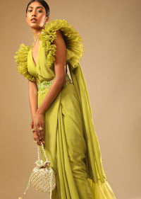 Lime Green Saree In Crepe With Elaborate Ruffle Sleeved Crop Top And Heavy Stone Embroidered Belt