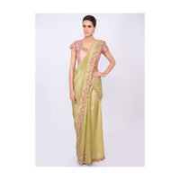 Lime green two piece saree with draped pleats and detached pallo only on kalki