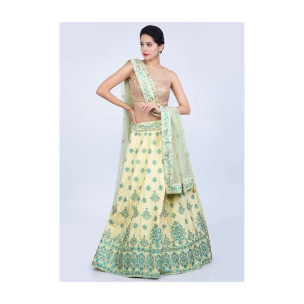 Lime yellow abstract print cotton silk lehenga with lime green net dupatta in butti and border only on Kalki