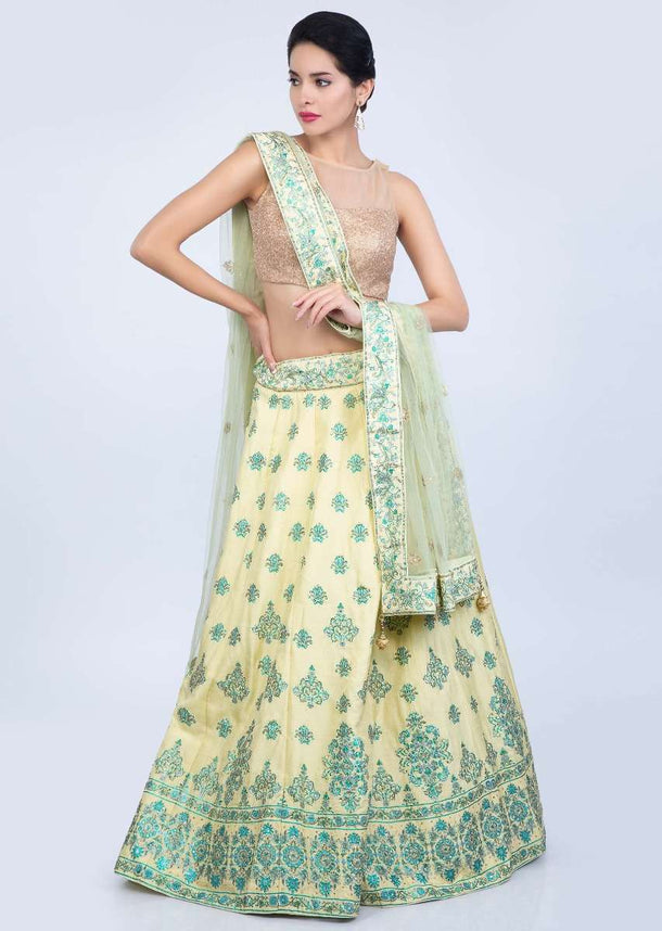 Lime yellow abstract print cotton silk lehenga with lime green net dupatta in butti and border only on Kalki