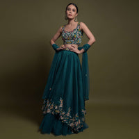 Teal Lehenga Choli In Cotton Silk With Fancy Cutout Hemline And Floral Embroidery