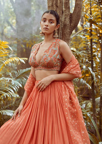 Fusion Coral Skirt In Crepe With Hand Embroidered Raw Silk Choli With Plunging Neckline