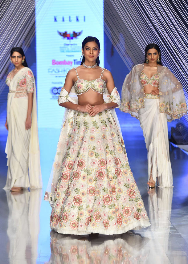 Cream Lehenga With A Crop Top In Moti Embroidery, Crafted In Organza With 3D Flower Motifs Embroidery