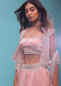 Powder Pink Lehenga And Crop Top In 3D Sequins Floral Motifs Embroidery, The Crop Comes In A Spaghetti Strap, Jacket In Sleeveless In Stones Emroidery