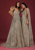 Net Oyster Gown With Layers, Embroidery Of 3D Petals And Moti, And A Cold Shoulder Neckline