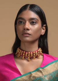 Magenta Braided Choker And Earrings Set With Gold Plated Ethnic Charms Studded With Green And Magenta Stones Online - Kalki Fashion