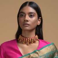 Magenta Braided Choker And Earrings Set With Gold Plated Ethnic Charms Studded With Green And Magenta Stones Online - Kalki Fashion