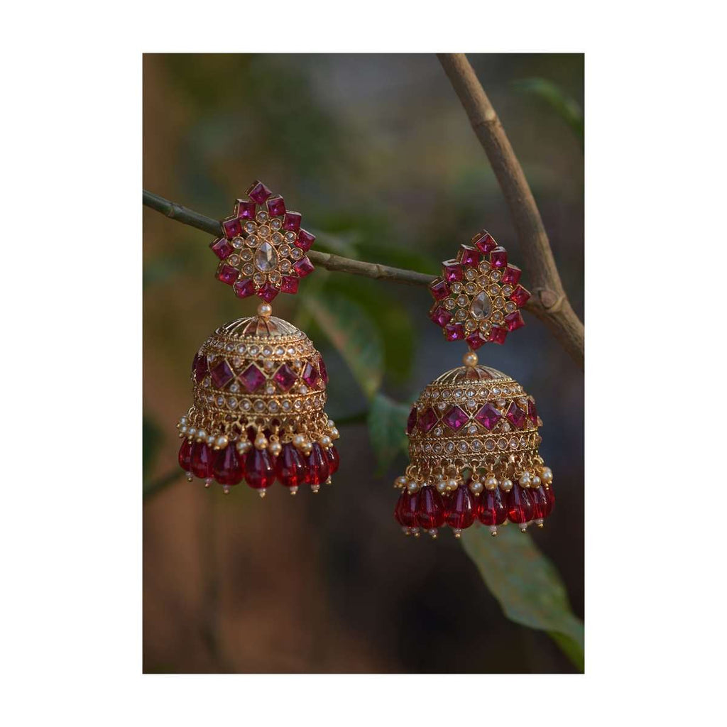 Magenta Crystals Studded Gold Plated Jhumkas With Dangling Beads Online - Kalki Fashion