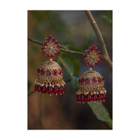 Magenta Crystals Studded Gold Plated Jhumkas With Dangling Beads Online - Kalki Fashion