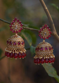 Magenta Crystals Studded Gold Plated Jhumkas With Dangling Beads Online - Kalki Fashion
