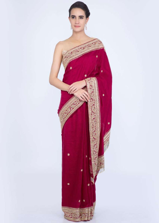 Magenta jute cotton saree with embroidered butti and border only on Kalki