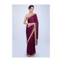 Magenta satin saree with golden scallop embroidered pallo only on Kalki