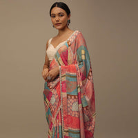 Marigold Orange Embroidered Muslin Saree With Floral Print And Scallop Borders