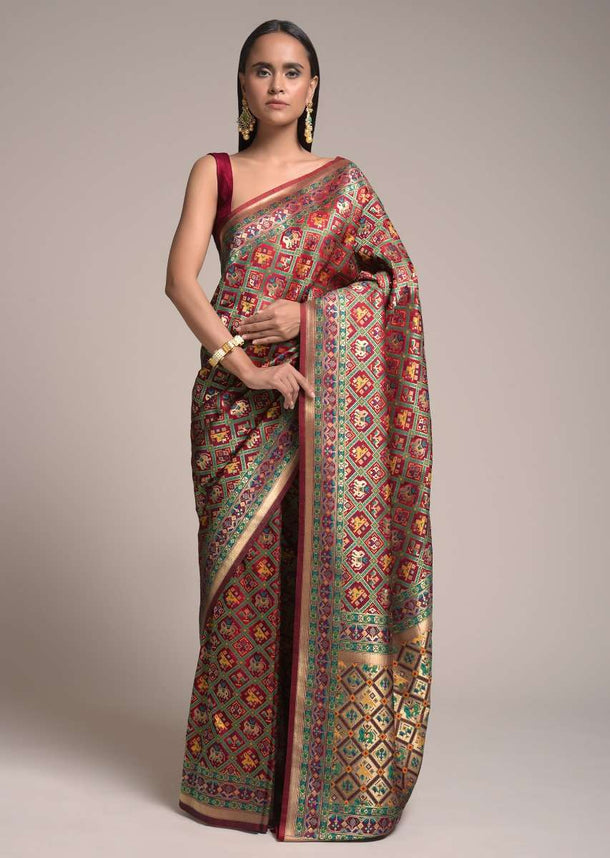 Maroon art handloom Saree In Silk With Colorful Woven Patola Jaal Online - Kalki Fashion