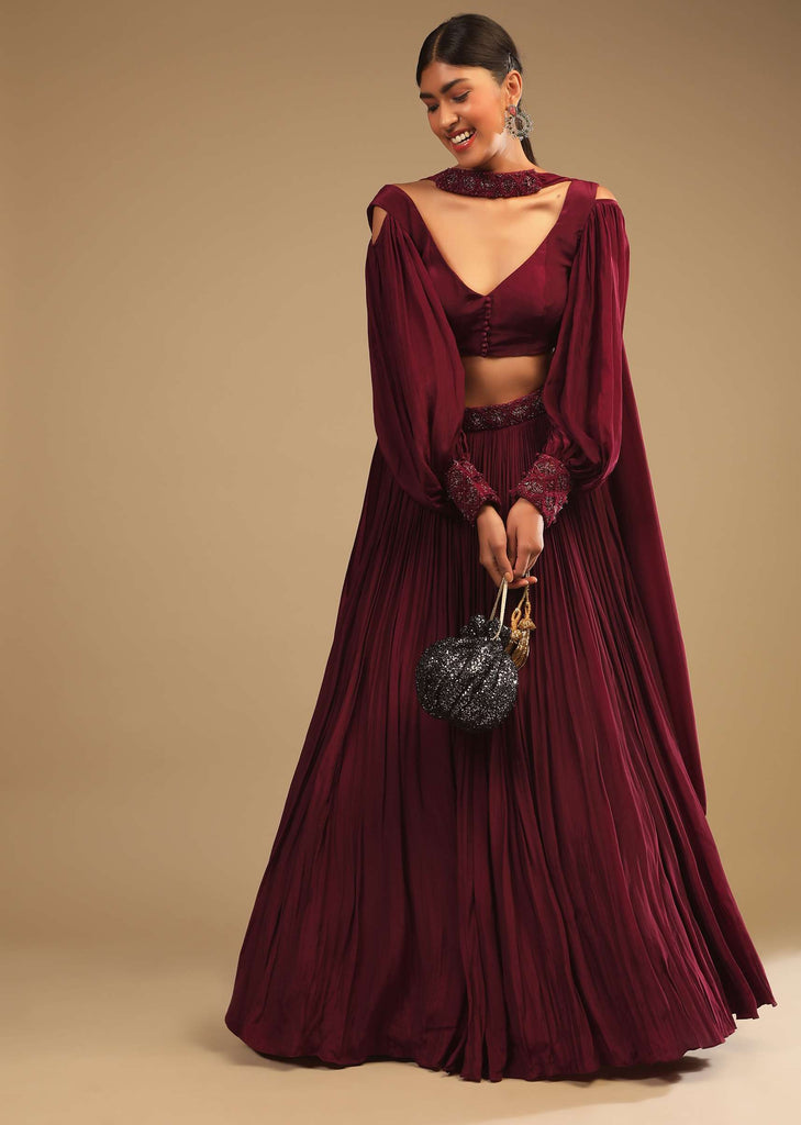 Maroon Lehenga In Crepe With Embroidery Detailing On The Waist And Bishop Sleeved Crop Top